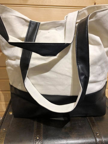 Lined Canvas Tote with Black Vegan Leather Bottom.